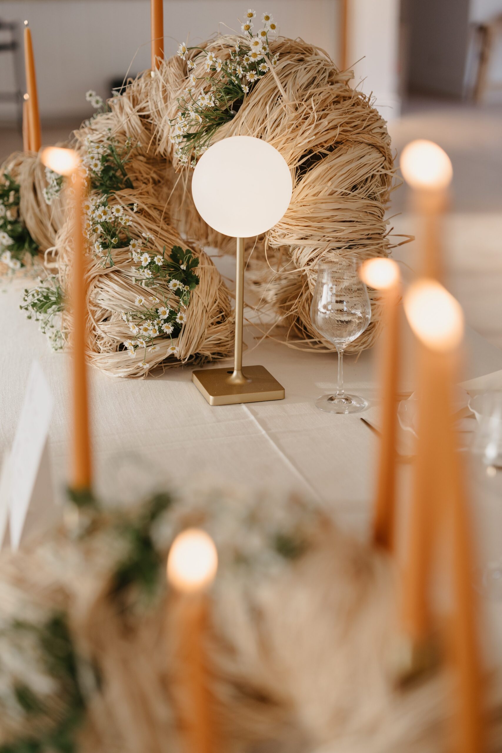 Acreate Styled Shoot Elegant wedding table styling with sculptural raffia décor, warm taper candles, globe lighting and delicate florals by a|CREATE